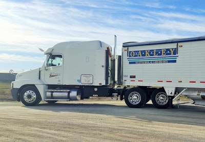 Moore’s 2007 Century Class and hopper trailer.