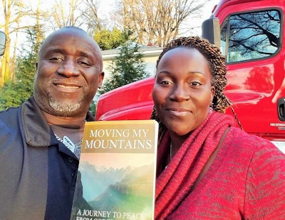 Glenn Keller, significant other Faye Smith and Keller’s “Moving My Mountains” book. The book is available in print via this link to BN.com and this to Amazon, among other retailers.