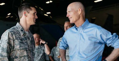 Florida Gov. Rick Scott (right)