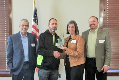 First-place award winner Darren Isenberger is pictured here with Griffith (left), Jeanne Mannes’ surviving daughter Charlyne Cox and Dale Conard (right). Award criteria involved driver performance in the Vigillo company’s driver monitor “as it pertains to speeding, DOT inspections and CSA violations,” the company notes. The company reps use the FMCSA portal and driver PSP reports to check inspections, crashes and the like. The Speedgauge add-on to Conard’s PeopleNet e-logs service compares driver speed versus posted speed limits. Periodic reviews with the Conard safety department also figure in.