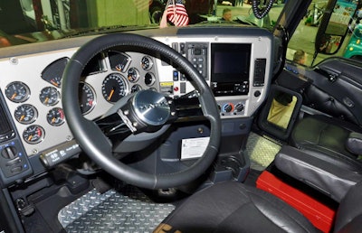 The dash includes a touch-screen infotainment system.