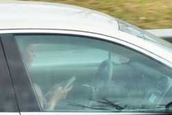 driver-multitasking-four-wheeler-texting-2017-04-17-12-35