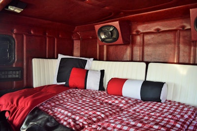 The tastefully appointed interior is decked out in red, white and blue and preserves the original feel of the sleeper paneling.