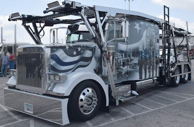 Jake and Stephanie Robak's 2006 Peterbilt 379 Cottrell Car Carrier. The truck is a tribute to...