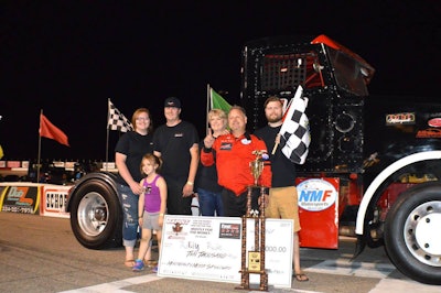 Ricky “Rude” Proffitt celebrates his second win in as many races in the Minimizer Bandit Big Rig Series at Montgomery Motor Speedway in Alabama. (Photo courtesy Leaha Proffitt)
