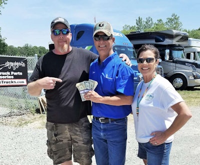 George (left) with the Weavers and their cache of $2 bills.