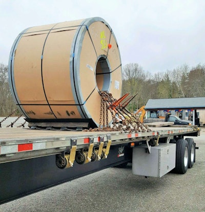 “When the coils get big, you don’t chain them to the trailer,” Bielucki wrote with this one. Rather, “you chain the trailer to the coil. Notice the bow in the side rail near the chains!”