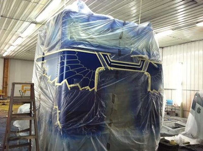 The brothers decided on a blue background with bronze-and-rust thunderbird wings that spread from the grille to the doors.