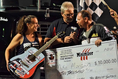 Morgan was presented with a custom-designed guitar by Highland Rim event emcees, as well as the big ol’ check for the win.
