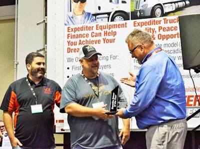 Robert Burton accepts the first-ever Expediter of the Year Award in 2017 at the Expo.