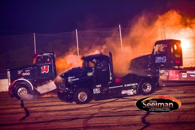 Minimizer Bandit Big Rig Series points leaders Ricky “Rude” Proffitt (No. 14) and “88 Mike” Morgan (No. 88) collided at the series’ most recent race at Madison International Speedway, while collecting Tyler Kruckeberg (No. 54), allowing the points standings to tighten. (Photo by Chris Seelman Photography)