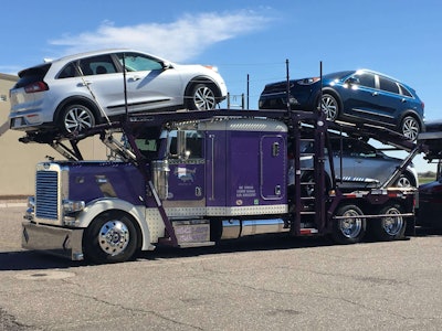 Tennessee-based Jeff Bencic made the most of a parking lot accident and made over his 2014 Peterbilt 388 car hauler with a new paint job, accessories and lights.