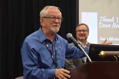 Nemo speaking at a surprise ceremony held Friday to honor him with three achievement awards.