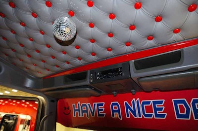 More than 800 upholstery buttons add a classy look inside, highlighted by a small disco ball.