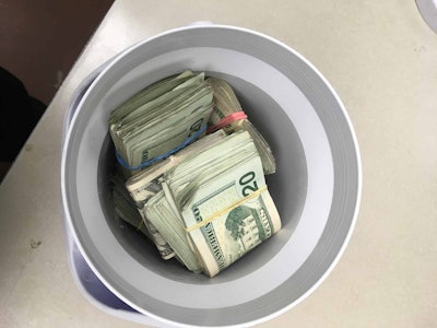 The Arizona DOT seized $29,000 that was found in a small cooler inside a truck during an inspection. The truck did not have registration or a trailer, and ADOT officers said the trucker and his passenger had a “suspicious story.”