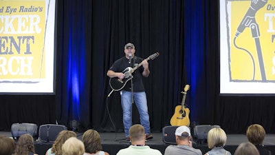 Richard Woods played in front of a crowd of GATS attendees, family members and the Trucker Talent Search judges Friday. (Photo by Ian Holl)