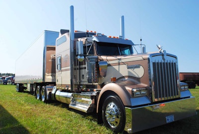 Engbarth showed his ’09 KW with his 2015 Utility dry van, ordered with logistics posts for interior securement required with many of his loads, likewise an under-van aerodynamic device to make him legal for California’s GHG trailer regs.