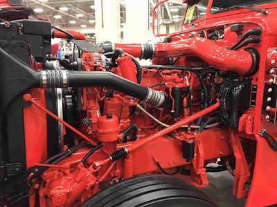 The truck features an ACERT Cat with a PDI single turbo that’s painted red and black to match the rest of the rig.