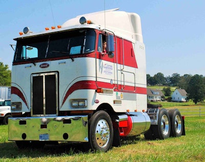 Who’s the kid behind the wheel of that cabover Pete? Why, that’s Carson, owner-operator James Ryan’s youngest. Ryan, based in Belmont, N.C., hauls a mostly dedicated container run from the port of Savannah, Ga., back up to the Charlotte area, leased to Lightning Transportation. The rig is powered by a 350 Cummins Big Cam 4 — and was formerly owned by Ryan’s father, small fleet owner Art Nelson.