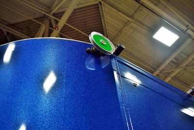 The electric motors powering the tarping system are mounted inside the dump’s frame, enhancing the unit’s clean, streamlined look.