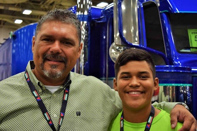 Jarco Transport/Madden Materials small fleet owner Joe Regalado and his son, Chris, at the Great American Trucking Show with Blue