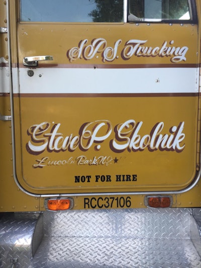 The first owners were a represented by the original insignia here on the doors — by the time Krumpton had gotten in touch with them, owner-operator Steve P. Skolnik had passed, but his wife obilged passed along plenty of memories about their time hauling. Come to find out, Krumpton says, they “had gotten married in the truck.”