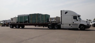 This generator was being dropped at a distribution point in Bryant, Texas, after Hurricane Harvey. Hurricane recovery is one of the factors, in addition to the ELD mandate, that is expected to tighten truck capacity and push up rates. (photo by Federal Emergency Management Agency)
