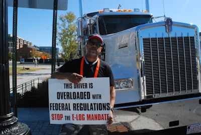 North Carolina-based Cedric Mitchell, pictured on Wednesday near DOT headquarters, says drivers “haven’t had a wage increase since the 1970s” – meanwhile costs for most everything have doubled or tripled. The ELD mandate is yet another such cost that needn’t be imposed by regulation, he believes.
