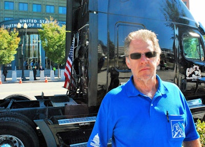 Doug Viaille, out of Garland, Texas, is owner-operator of Goat’s Transport LLC. He participated in Operation Black and Blue’s wee-hours parking protest efforts in D.C., here pictured on Wednesday outside of Department of Transportation headquarters. He joined the group coming into D.C. from the Leesport, Pa., Big Rig Rendezvous, where began the establishment of a new advocacy group centered around drivers/small-biz carriers’ interest — the United Motor Carrier Council. More on that group in a future post.