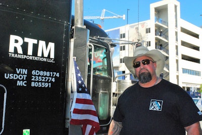 Independent owner-operator Joe Alfaro is of Cuban-American descent — his father immigrated to the U.S. in the 1960s — and pictured here across the street from the Washington Nationals baseball stadium, near DOT headquarters, on Wednesday. His heritage, baseball, standing up for what you believe in — “it doesn’t get any more American than that,” he said then.