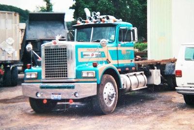 This 1985 Diamond Reo started its life as a long-haul, dump-trailer-pulling unit, Rick said, in the Rhodes’ fleet. “Dad still drove some back then. Back in the probably late 1990s/early 2000s, the Diamond Reo … now was a short-haul coal hauler tractor,” then proceeded to “its present life: we stretched it and put a roll-off frame on it. I talked dad into taking it to the local truck pulls when he was in his 60s. We went over and here’s all these straight-truck-class drivers, young drivers all. ‘Hey what does that old driver think he’s going to do?'” Rick aired down the tires for him, slid the body back over the rear drives. “When he took off, he had it in the right gear, and that Reo came up on the boost – 319 or 320 feet, and 300 was a full pull. He beat the guy who had won the class ever since they started, and to this day some of the guys still ask us when we’re going to bring that Diamond Reo back down to the truck pulls. Dad really showed those young boys where it was at that day, made me feel good to see that big smile on his face.”