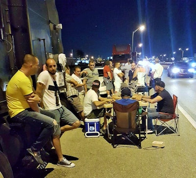 Participating truckers gathered together last night along Okeechobee Blvd. Photo by Fernando Collazo
