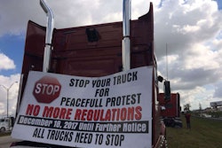 Protest-sign-calling-for-shutdown-dec-18-2017-miami-2017-12-19-16-58