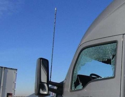 A truck driver was shot at while driving down I-30 in Texas in an apparent act of road rage. The driver was injured by his shattered window. (Rowlett Police Department)