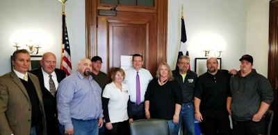 From left: MyRiteLoad’s Matthew Kane; truckers Doug Hasner, Joe Alfaro, John Grosvenor and Lisa Schmitt; Senator Ted Cruz; truckers Shelli Conaway, Lee Schmitt, Dave McCauley, and Brandon McCauley