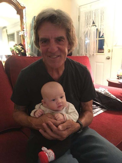 Cargo and his baby granddaughter.