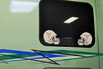 Jerry Boyd is the proud grandfather of two, his daughter’s son and daughter Boyd and Hanna, here honored on the sleeper window with these Tennessee Vols helmets.