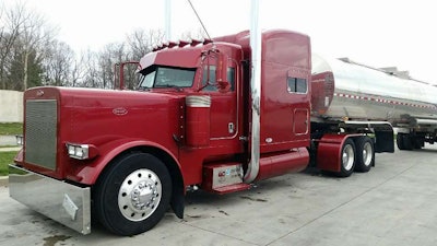 Robert and Kathy Cass own this 2006 Peterbilt 379, “Sweet Satisfaction.” The couple, leased to Quality Carriers, hauls liquid soap on a dedicated run for Unilever.