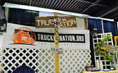 A few spots down from the ICG booth in the Pavilion, the ELD or Me/Trucker Nation booth got creative front-porch treatment from Andrea Marks — the 85, she explains, is a reference to an upcoming Twitter campaign the group is planning around “the other 85 percent,” or what they say is the percentage of the industry made up of smaller carriers and owner-operators. The group is putting on an event March 31 in Nashville featuring a talk by controversial former sheriff and current Arizona Senate candidate Joe Arpaio.