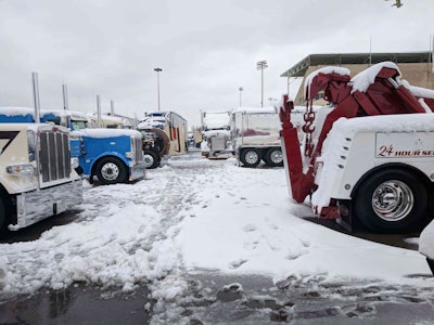 The snow-covered lot where PKY trucks are staged in Louisville.