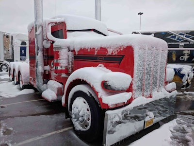 The snow-covered lot where PKY trucks are staged in Louisville.