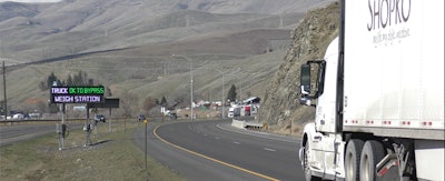 New signs at the Lewiston Port of Entry along U.S. 95 in Idaho will signal truckers on whether or not they can bypass the weigh station.