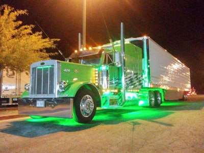 Jeremy Ward says people know his truck for the lime green under glow. Jeremy says his father, being from the “old school,” would never run his old truck with the “new school” look Jeremy has added to it.