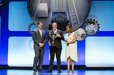 EpicVue’s Lance Platt and TCA’s Highway Angel Spokesperson Lindsay Lawler with the 2017 Highway Angel of the Year, Challenger Motor Freight driver John Weston (center), who was recognized for his heroic deed.