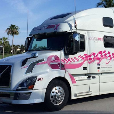 The X50 custom-designed flag mounts are shown here mounted on the Volvo that designer and trucker Eugene Leptien drives in a car-haul operation out of his home base in Wisconsin.