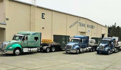 Left to right, Jerry Boyd, Carl Lawrence and Bob Hubbard’s rigs this past Thursday loading out of Oak Harbor, Wash., bound for Fairbanks, Ak.