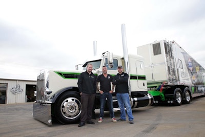 “Fast N’ Loud” star Richard Rawlings (center), who owns Gas Monkey Garage, took delivery of the custom Pete 389 in January. With him are Tommy Fitzgerald Jr., left, and Robert Fitzgerald outside Gas Monkey Garage in Dallas.