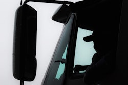 driver-leaning-on-door-in-cab-2018-04-02-15-15
