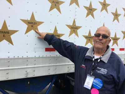 Keith Wagner led the 29th annual Mother’s Day Convoy by raising the most money out of all participating truckers. He is shown here pointing to the star honoring his late granddaughter on his trailer.