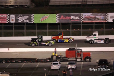 Bandit Series racers Allen Boles (No. 3) and Ricky “Rude” Proffitt (No. 14) battle for the lead at Motor Mile Speedway in April. (Photo courtesy Robyn Kruckeberg)
